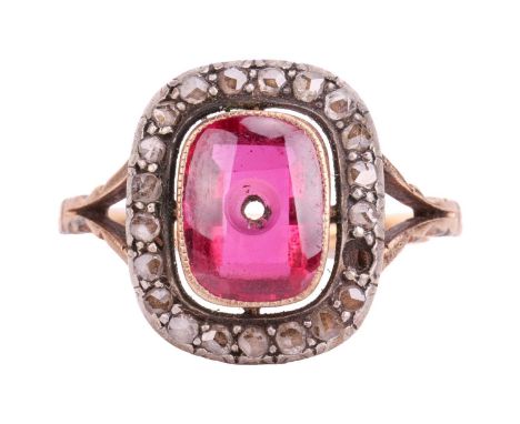 A diamond and synthetic ruby panel ring, centred with an empty cushion-shaped synthetic ruby panel, in collet within a diamon