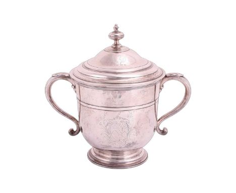 A Queen Anne silver two handled cup and cover by Francis Garthorne, London 1706, the domed cover with triple knop finial, wit