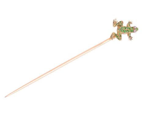 A demantoid garnet frog stick pin, encrusted with rose-cut diamonds as eyes, fitted on pin stem, yellow metal bearing French 