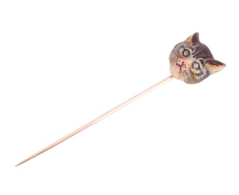 An Edwardian cat head enamel stick pin, sculpted as a realistic head of a tabby cat, painted with fine polychromatic enamel a