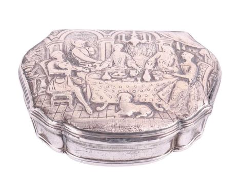 A Continental white metal snuff box of cartouche shape, circa 1750, cover chased with a family dining around the table with a