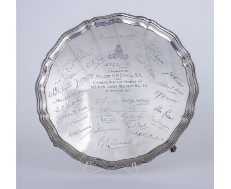 A George VI Silver Circular Salver, by Barker Brothers Silver Ltd, Birmingham 1939, the shaped and moulded rim with bead moun