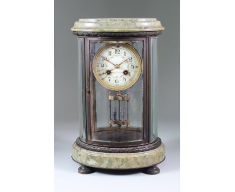 A late 19th/Early 20th Century French "Fourglass" Oval  Mantel Clock, No.3080, the 3.5ins diameter white enamel dial with Ara