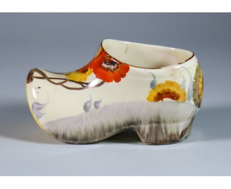 Rhodanthe, a Clarice Cliff Clog, painted in colours, 5.75ins wide x 3.25ins high, printed mark with Wilkinson backstamp