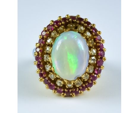 An Opal, Ruby and Diamond Cluster Ring, 20th Century, 18ct gold set with a central opal,  approximately 3ct, and alternating 