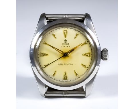 A Mid 20th Century Tudor Oyster Manual Wind Wristwatch, stainless steel case, 34mm diameter, the white enamel dial with gold 