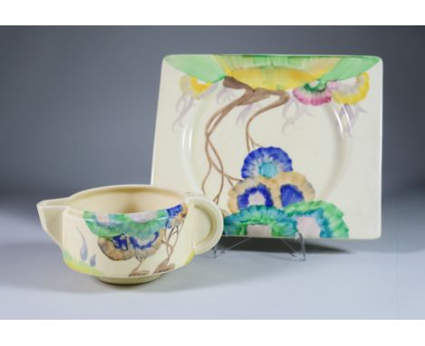 Aurea, a Clarice Cliff Biarritz Bizarre Plate and a Circular Sauce Boat, the plate 9ins x 7.5ins, the sauce boat 2.75ins high
