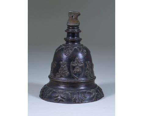 An Italian Brown Patinated Bronze Hand Bell, Early 17th Century, cast with two shields, flowering motif and acanthus, 4.75ins