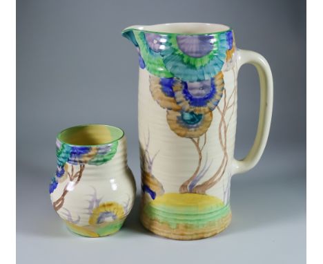 Viscaria, a Clarice Cliff Bizarre Lynton Jug and Vase, each painted in colours, the jug 11ins high, the vase shape no.565, 5.