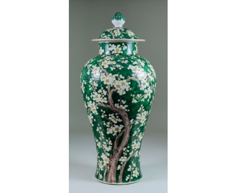 A Chinese Porcelain Baluster-Shaped Vase and Cover, Early 20th Century, enamelled in famille verte palette with prunus flower