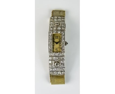 An Early 20th Century Lady's Diamond and Platinum Manual Wind Wristwatch, platinum case set with old European cut diamonds, a