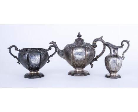 A Victorian Scottish Silver Three-piece Tea Service,  by J.M. Glasgow 1852, of bulbous panelled form, engraved with oval bead