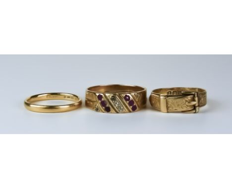 Three Gold Rings, 20th Century, comprising - an 18ct band set with three small diamonds and six small rubies, size Q, Gross w