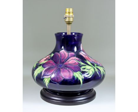 A Modern Moorcroft Pottery Table Lamp, tube-lined and decorated in colours with a poppy design, 12ins high, and shade for sam