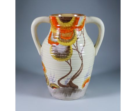 Rhodanthe, a Clarice Cliff Bizarre Twin-Handled Lotus Jug, painted in colours, 12ins high, printed mark with Wilkinson Ltd ba