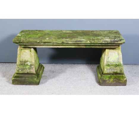 A Sandstone Bench, Early 19th Century, of architectural form, 47ins wide x 18ins deep x 21ins high