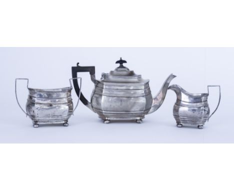 A George V Silver Rectangular Three-piece Tea Service, by George Nathan and Ridley Hayes, Chester 1912, of panelled form with