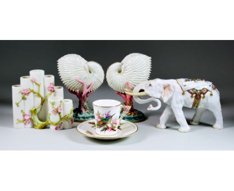 A Pair of Royal Worcester Bone China Nautilus Shell Vases, 1868, the moulded details naturalistically picked out in colours, 