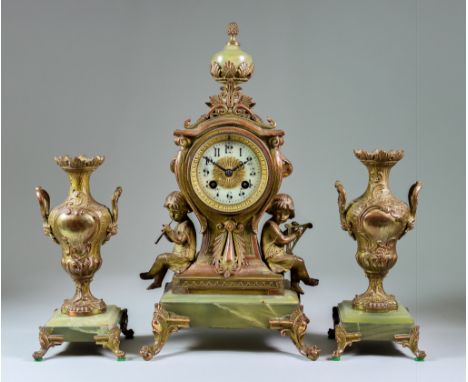 A Late 19th Century French Gilt Metal and Green Onyx Three-Piece Clock Garniture, by S. Marti and Cie, No.53658, the 3ins dia