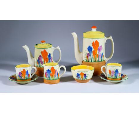 Crocus, a Clarice Cliff Bizarre Tankard Coffee Service for Six, painted in colours between yellow and brown bands, comprising