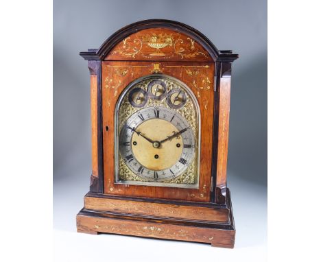 A Late 19th/Early 20th Century Rosewood Cased Mantel Clock, the 7.5ins arched brass dial with silvered chapter ring with Roma