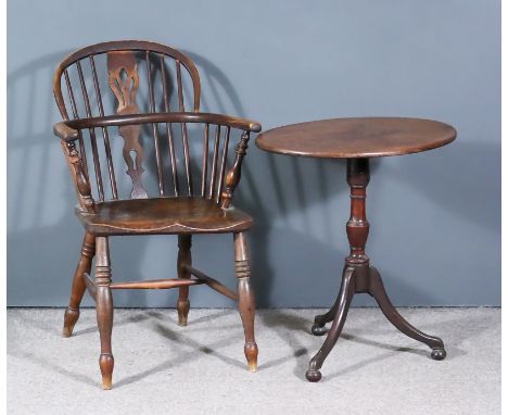 A 19th Century Ash and Elm Windsor Chair, with two tier stick back, fretted splats on turned front legs, and a George III mah