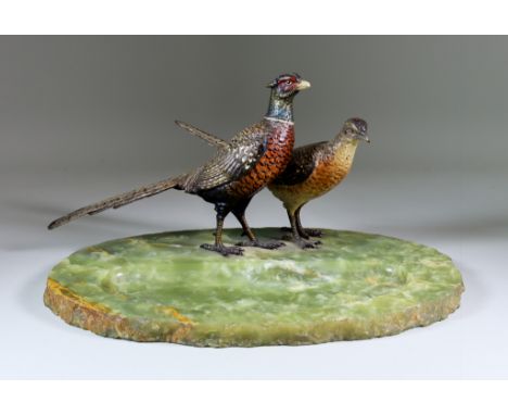 An Austrian Green Onyx Ashtray, mounted with two cold painted bronze figures of pheasants, 15ins x 10ins x 9ins high