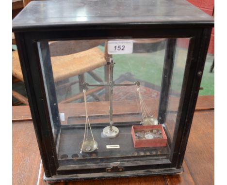 A cased set of scales and weights, by D. Koritschoner