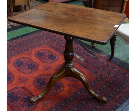 A 19th century  rectangular oak tilt top tripod table