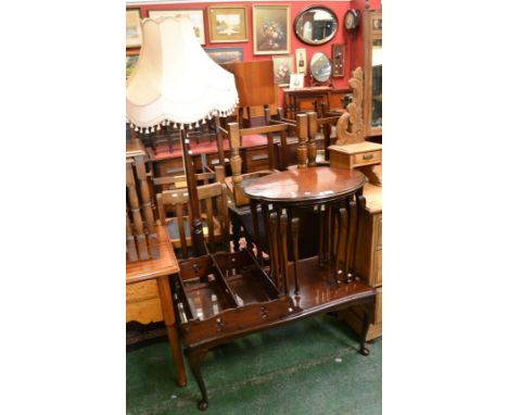 A reproduction mahogany coffee table; a reproduction walnut nest of tables; an Art Nouveau style plate rack; a reproduction m