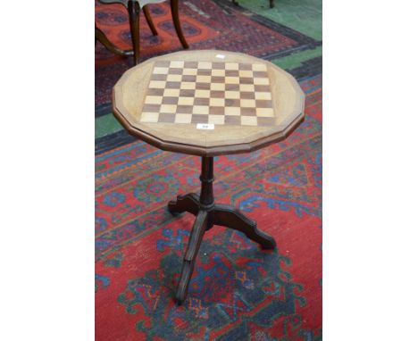 A Victorian style games table, tripod base