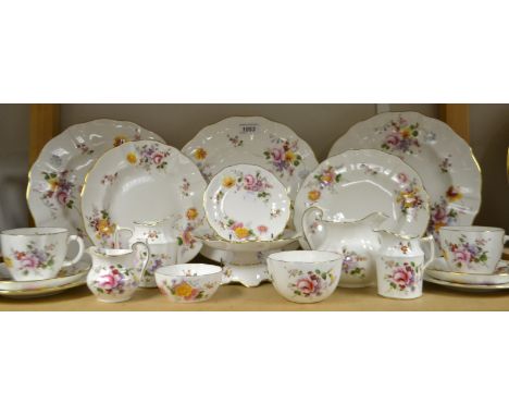 A Royal Crown Derby Posie pattern dinner plate, others, two tea cups and saucers, trinket dishes, cream jugs, comport, qty