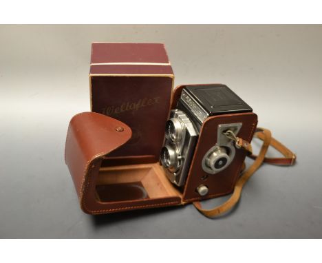 Photography - a Weltaflex twin lens camera, brown leather case, boxed with instructions