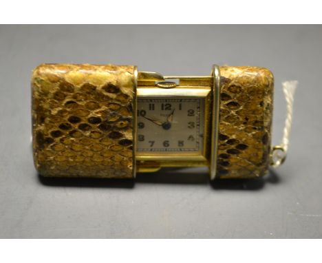 An Art Deco lizard cased purse watch