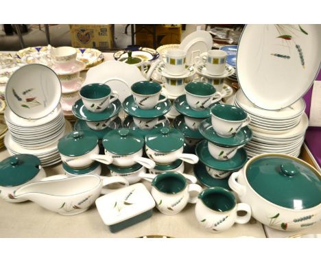 An extensive Denby Greenwheat dinner and tea service for twelve, including meat platter, oven dish, jugs, dinner and side pla