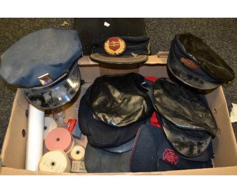 A British Railways worker's cap, enamel badge; another, similar; a National Bus cap; an L.M.S. bottler and stopper, c. 1900; 