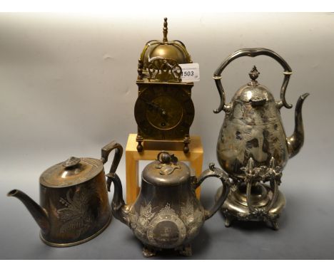 Metalware - a brass lantern clock; an aesthetic movement Britannia metal spirit kettle on stand; teapot; etc (4)