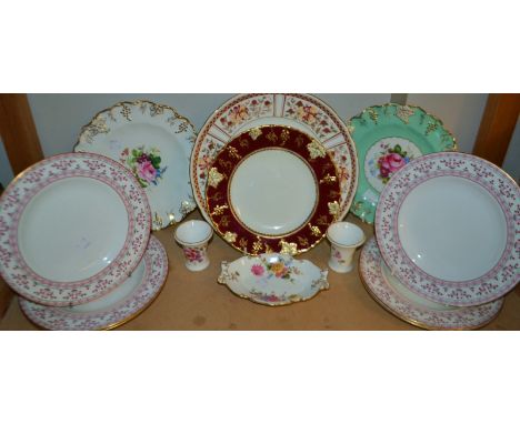 A Royal Crown Derby Honeysuckle pattern plate; a Floral Garnet plate; a Vine plate; a set of six side plates printed with che