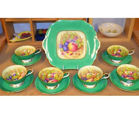 An Aynsley hand painted and printed tea service for six, decorated with fruit and leaves, apples green ground