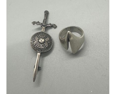 Modernist silver ring and a scottish brooch 