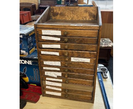 Vintage 12 drawer multi drawer measures approximately 23 inches tall
