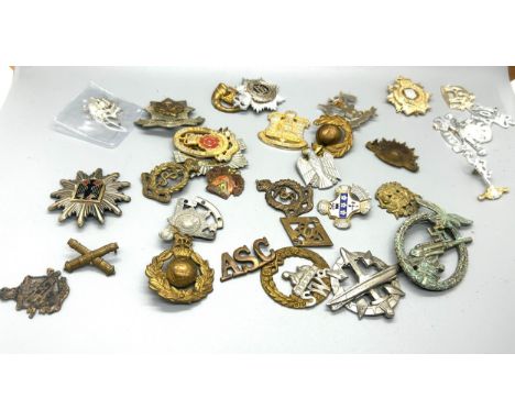 Selection of vintage cap badges, to include military and police pieces 