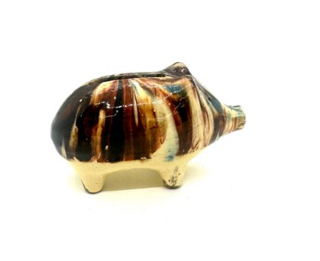 Vintage slip ware pig money bank measures approx 4 inches wide by 2.5 inches tall