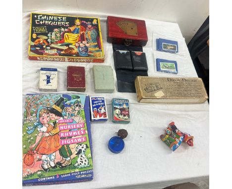 Selection of vintage games, Chinese chequers, nursery rhyme puzzle, Bristol playing cards in leather case, Kelloggs frosties,