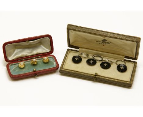 A cased set of four Art Deco black onyx button dress studs, with rose cut diamond stitch detail to centre (tested as 18ct), t