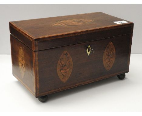 A Georgian mahogany shell inlaid tea caddy