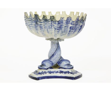 A 19th century Worcester bon bon dish, the castelated bowl raised on triple dolphin support, 13cm tall (a/f)