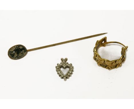 A gold single stone moss agate cabochon stick pin (tested as 9ct gold), a gold diamond heart shaped pendant (9ct gold), and a