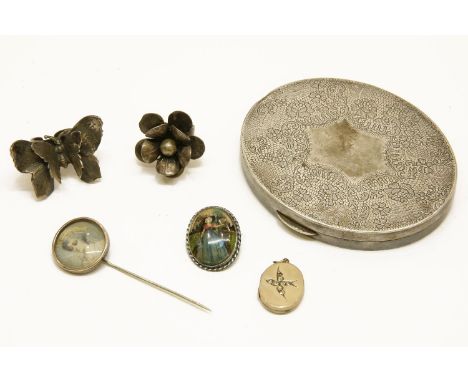 A collection of costume jewellery, to include a rolled gold and paste stone oval locket, a French silver compact marked Rocha