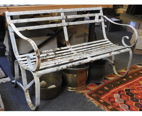 An Edwardian white painted wrought iron bench, together with a jelly pan, two coal scuttles, and four metal claw and ball fee